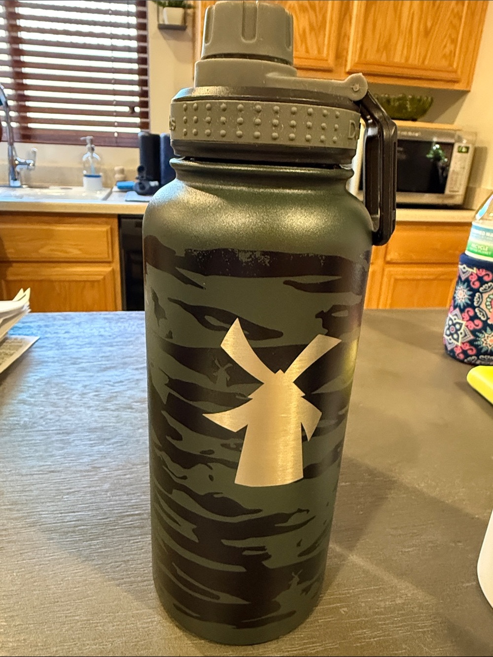 Dutch Bros Green and Black Camo Stainless Bottle with Windmill Logo Water Bottle
